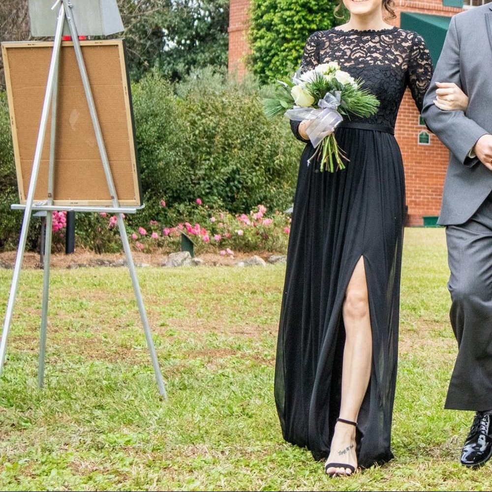 Worn Black lace David’s Bridal bridesmaids dress.
